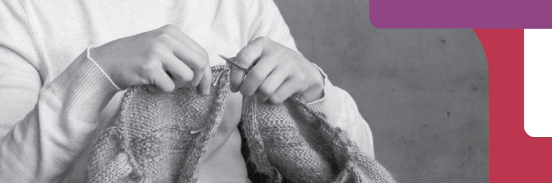 Image of two hands holding a piece of knitted cloth.