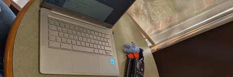 A student laptop on a high table at Cumberland branch