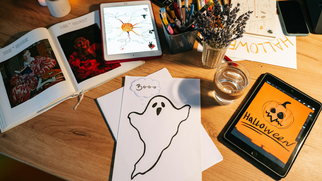 A table with drawings of a ghost and a pumpkin